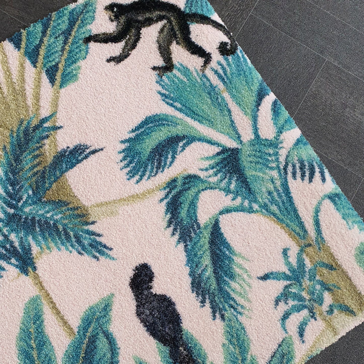 Close up of pink mat with tropical pattern print